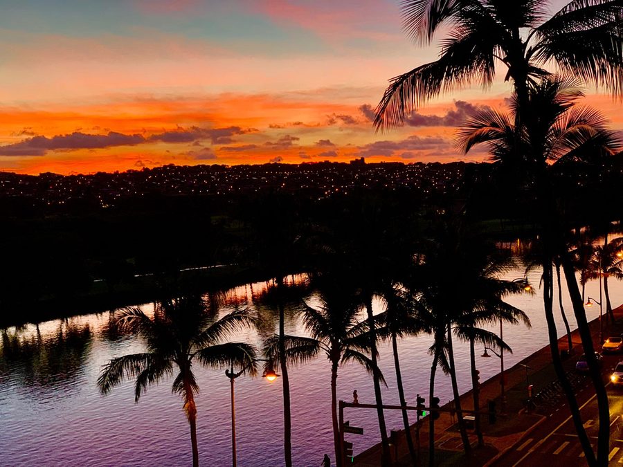 Ala Wai canal at sunset with city lights